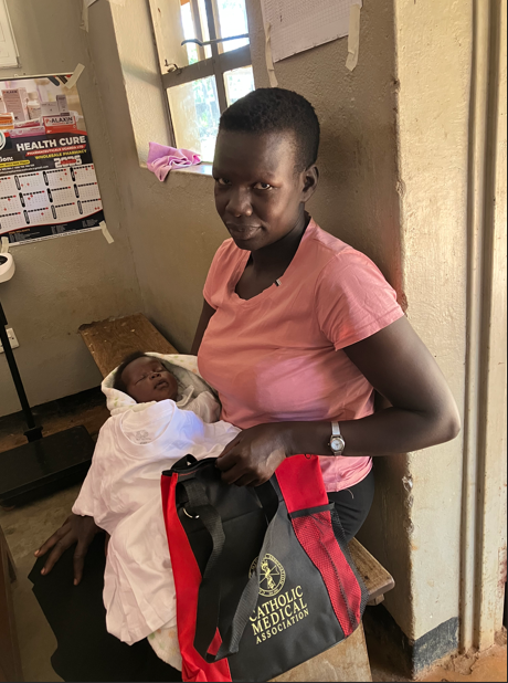 CMA Couple Caring for the Spiritual and Physical Needs of the Acoli Tribe